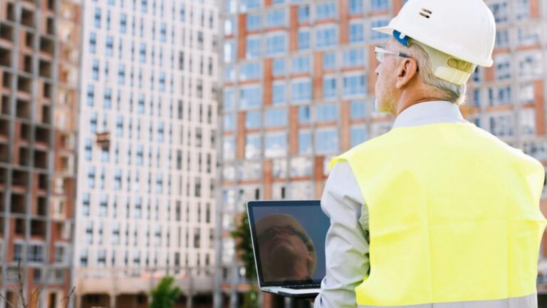 An onsite contractor checking plans.