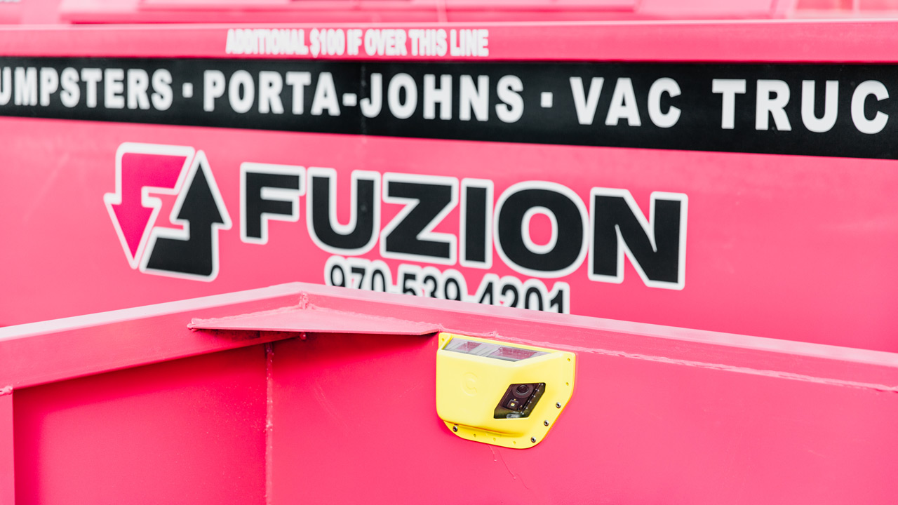 A close-up image of a Fuzion 20-yard dumpster in Colorado.