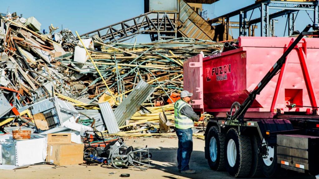 A Fuzion professional at a scrap metal recycling site.