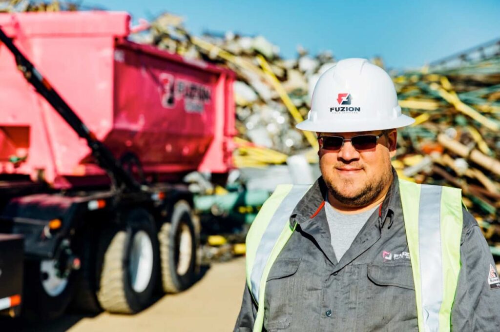 Fuzion Field Services professional with a truck ready at the landfill.