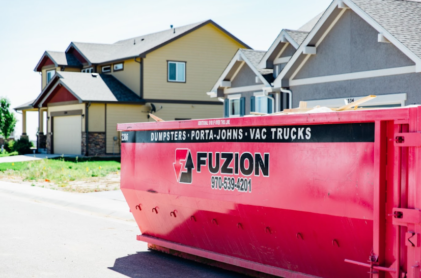 Residential roll off dumpster provided by Fuzion for dumpster trash removal during home construction.