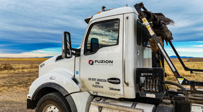 Service truck used in waste management operations highlighting compost vs landfill disposal options.
